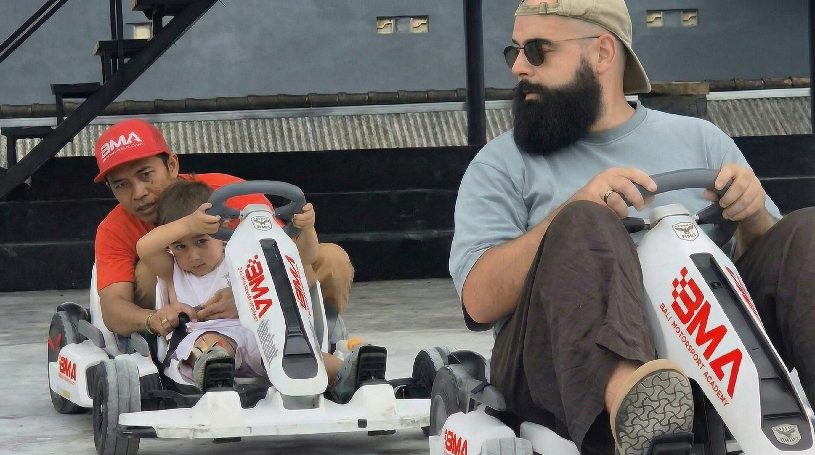 Father and son building and driving a drift car together at Bali Motorsport Academy